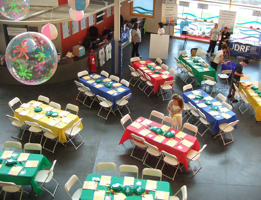 Decorated tables set up in lobby of the Museum.